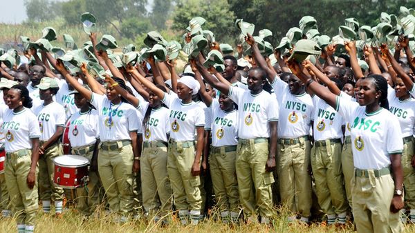 Corps Members carrying out salutations in Parade 